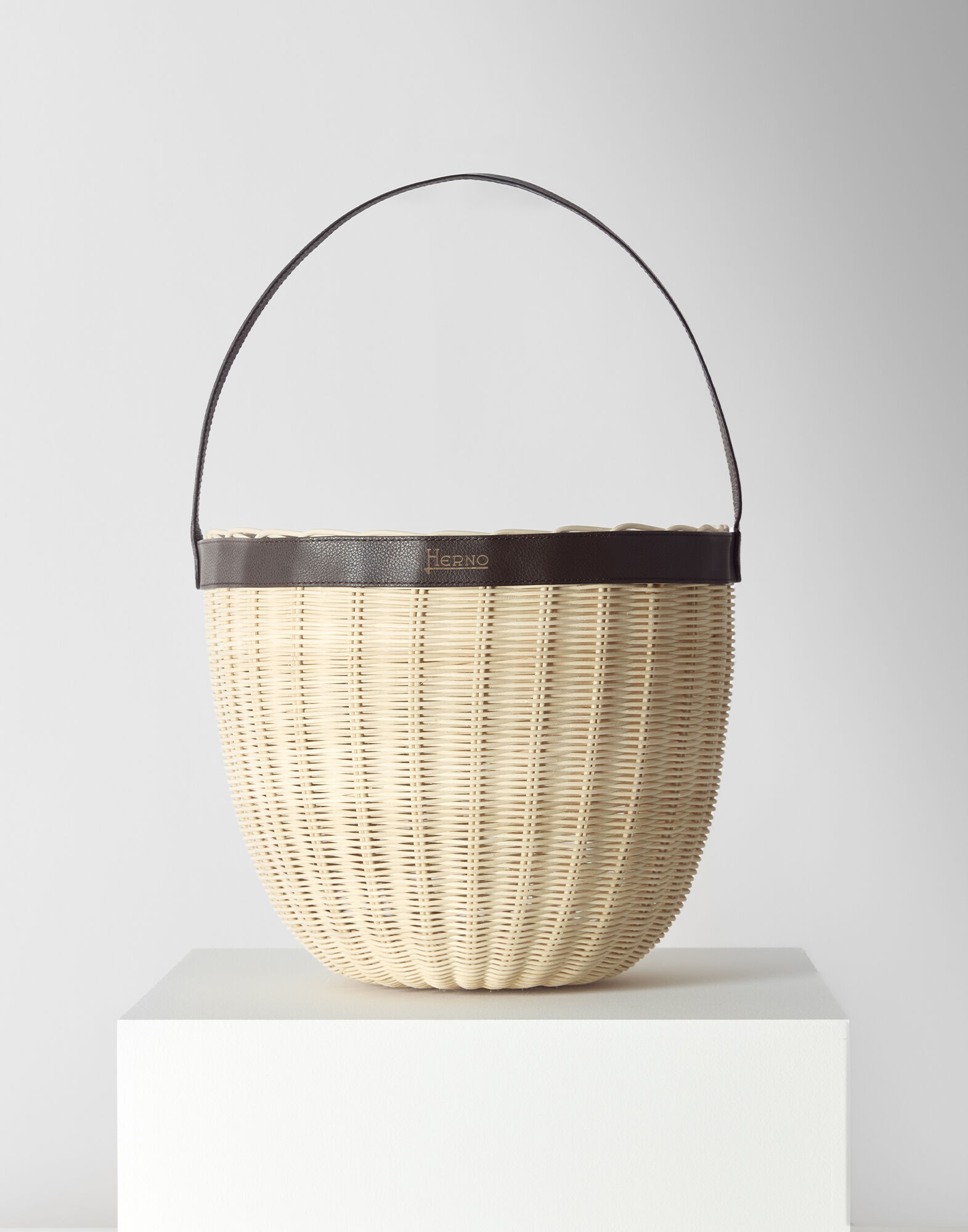 RATTAN AND LEATHER BASKET